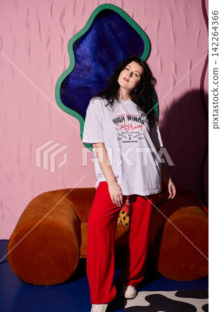 Stylish woman posed amidst artistic lighting and retro inspiration Stylish woman posed amidst artistic lighting and retro inspiration 142264366