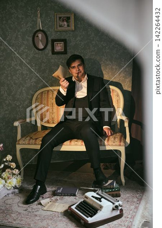 Caucasian historian archiving letters in vintage interior Caucasian historian archiving letters in vintage interior 142264432