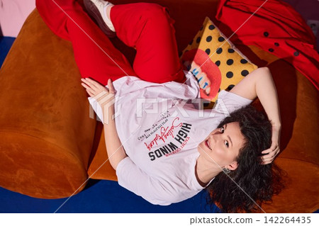 Female figure emanates confidence with vivid and fashionable environment Female figure emanates confidence with vivid and fashionable environment 142264435