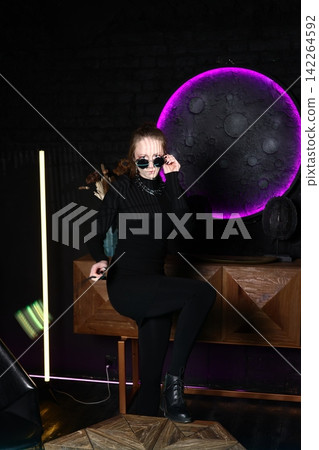 Underground club scene featuring DJ with neon lights and powerful sound Underground club scene featuring DJ with neon lights and powerful sound 142264592