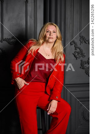 Authoritative white lawyer in vibrant attire exudes confidence Authoritative white lawyer in vibrant attire exudes confidence 142265296