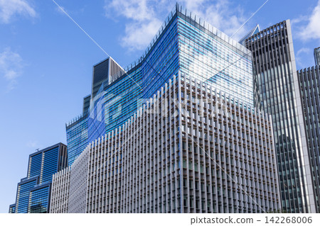 Glass and steel high rise office building in city Glass and steel high rise office building in city 142268006
