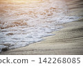 Foamy waves on the beach; a concept for relaxation. 142268085