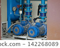 Large water pump motor in the control room. 142268089