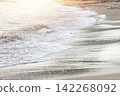 Waves crashing on the shore; a relaxing concept. 142268092