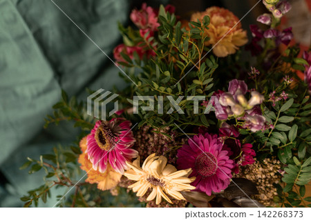 Colorful floral bouquet with pink and yellow gerbera daisies Colorful floral bouquet with pink and yellow gerbera daisies 142268373