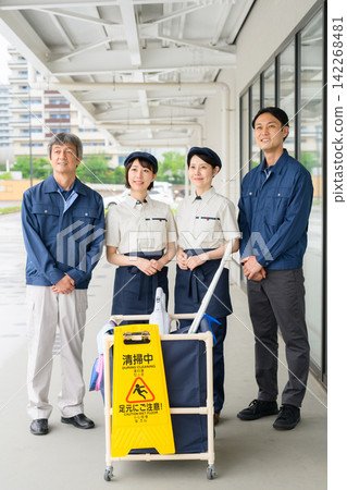 Four men and women who are staff members for building cleaning and facility maintenance. Four men and women who are staff members for building cleaning and facility maintenance. 142268481