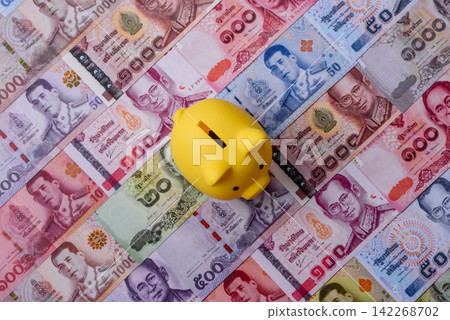 A piggy bank as a concept for storing, accumulating, and saving financial resources A piggy bank as a concept for storing, accumulating, and saving financial resources 142268702