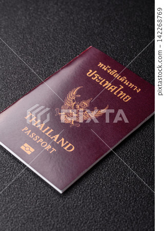 Thailand passport for travelling, flying and doing business. Thailand document, id Thailand passport for travelling, flying and doing business. Thailand document, id 142268769