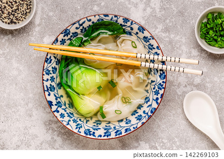 Soup with wontons and bok choy Soup with wontons and bok choy 142269103