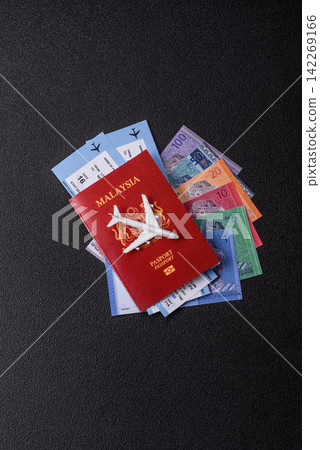 Malaysia passport for travelling, flying and doing business. Malaysian document, id Malaysia passport for travelling, flying and doing business. Malaysian document, id 142269166