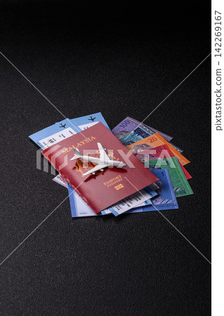 Malaysia passport for travelling, flying and doing business. Malaysian document, id Malaysia passport for travelling, flying and doing business. Malaysian document, id 142269167