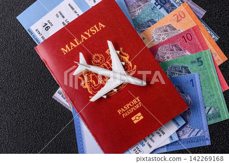 Malaysia passport for travelling, flying and doing business. Malaysian document, id Malaysia passport for travelling, flying and doing business. Malaysian document, id 142269168