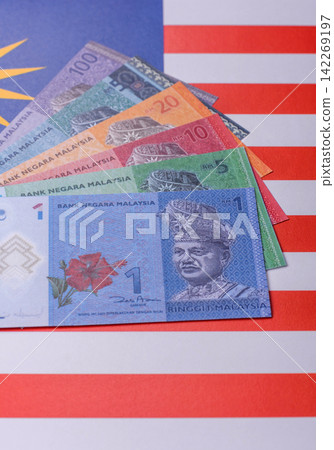 Malaysian ringgit banknotes as a tool for trade and financial transactions. The Malaysian ringgit Malaysian ringgit banknotes as a tool for trade and financial transactions. The Malaysian ringgit 142269197