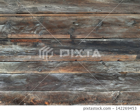 Weathered wood texture from an old wooden house, horizontal background Weathered wood texture from an old wooden house, horizontal background 142269453
