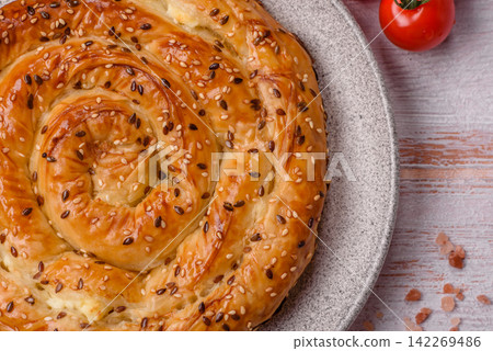 Greek cheese and sesame pie, a traditional Balkan dish. Balkan pie Greek cheese and sesame pie, a traditional Balkan dish. Balkan pie 142269486