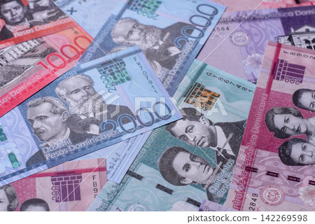 Dominican peso banknotes and coins as a instrument of trade and exchange. Dominican peso Dominican peso banknotes and coins as a instrument of trade and exchange. Dominican peso 142269598