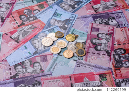 Dominican peso banknotes and coins as a instrument of trade and exchange. Dominican peso Dominican peso banknotes and coins as a instrument of trade and exchange. Dominican peso 142269599