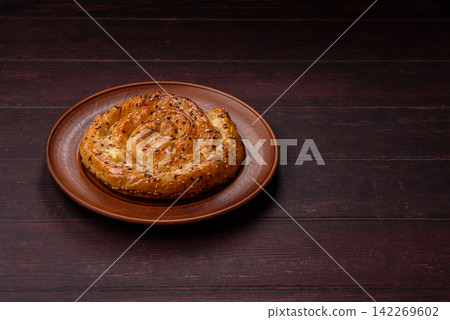 Greek cheese and sesame pie, a traditional Balkan dish. Balkan pie Greek cheese and sesame pie, a traditional Balkan dish. Balkan pie 142269602