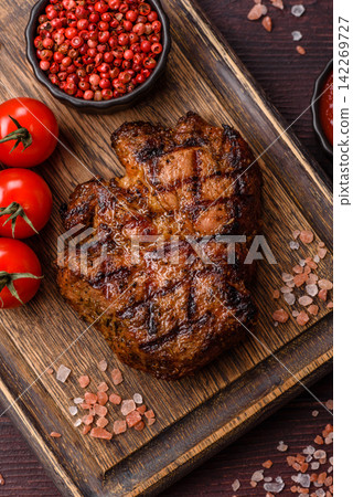 Grilled beef or pork steak seasoned with salt and allspice. Grilled steak Grilled beef or pork steak seasoned with salt and allspice. Grilled steak 142269727
