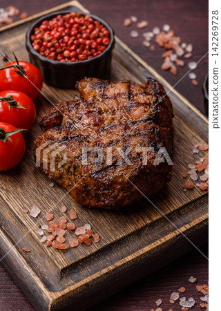 Grilled beef or pork steak seasoned with salt and allspice. Grilled steak Grilled beef or pork steak seasoned with salt and allspice. Grilled steak 142269728