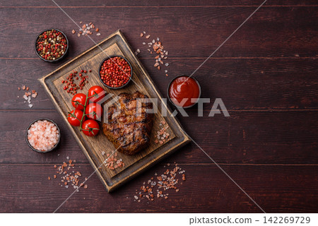Grilled beef or pork steak seasoned with salt and allspice. Grilled steak Grilled beef or pork steak seasoned with salt and allspice. Grilled steak 142269729