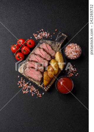 Grilled beef or pork steak seasoned with salt and allspice. Grilled steak Grilled beef or pork steak seasoned with salt and allspice. Grilled steak 142269732