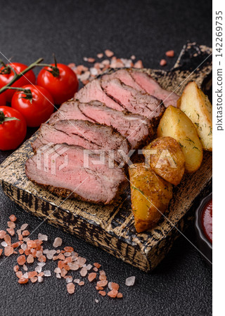 Grilled beef or pork steak seasoned with salt and allspice. Grilled steak Grilled beef or pork steak seasoned with salt and allspice. Grilled steak 142269735