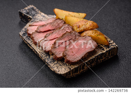 Grilled beef or pork steak seasoned with salt and allspice. Grilled steak 142269736