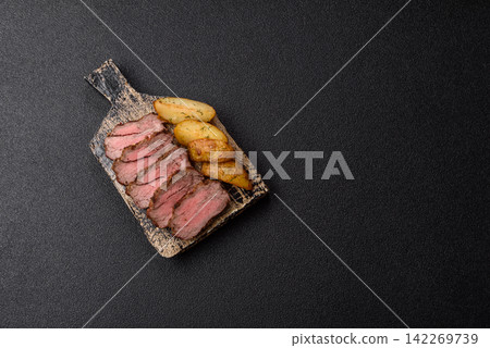 Grilled beef or pork steak seasoned with salt and allspice. Grilled steak Grilled beef or pork steak seasoned with salt and allspice. Grilled steak 142269739