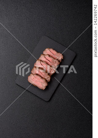 Grilled beef or pork steak seasoned with salt and allspice. Grilled steak Grilled beef or pork steak seasoned with salt and allspice. Grilled steak 142269742