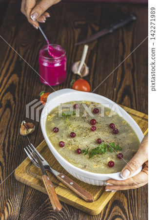 Tasty jelly with meat, beef aspic, traditional Christmas Ukrainian food Tasty jelly with meat, beef aspic, traditional Christmas Ukrainian food 142271989