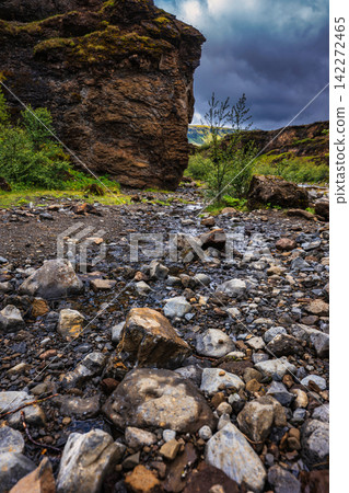 Rocky Mountain Stream with Moss-Covered Boulder in Iceland Rocky Mountain Stream with Moss-Covered Boulder in Iceland 142272465