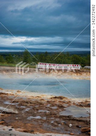 Red and White Barrier Fence on Geothermal Beach Iceland Red and White Barrier Fence on Geothermal Beach Iceland 142272492