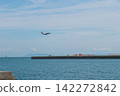 Watching airplanes under the summer sky in August 142272842