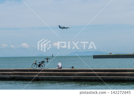 A beautiful moment of an airplane I encountered at a summer airport. A beautiful moment of an airplane I encountered at a summer airport. 142272845