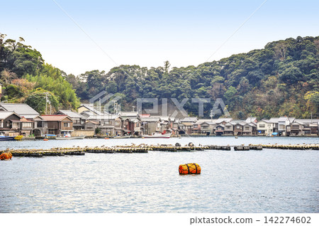 View of the boathouses from a sightseeing boat on the Ine Bay. 142274602