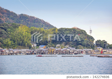 View of the boathouses from a sightseeing boat on the Ine Bay. View of the boathouses from a sightseeing boat on the Ine Bay. 142274606