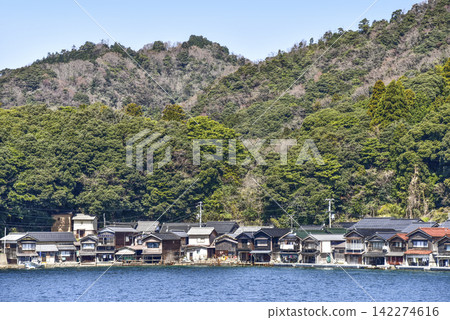 View of the boathouses from a sightseeing boat on the Ine Bay. View of the boathouses from a sightseeing boat on the Ine Bay. 142274616