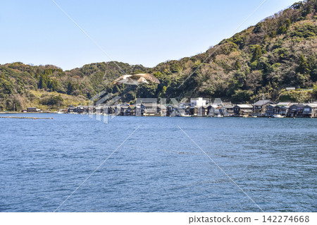 View of the boathouses from a sightseeing boat on the Ine Bay. 142274668