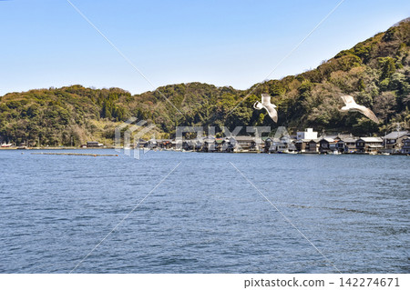 View of the boathouses from a sightseeing boat on the Ine Bay. 142274671