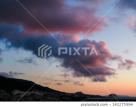 Early morning, above Mt. Kabuto in the Rokko Mountain Range, photographed from Higashinada Ward, Kobe City. Early morning, above Mt. Kabuto in the Rokko Mountain Range, photographed from Higashinada Ward, Kobe City. 142275994