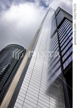Modern skyscrapers from street level, Madrid, Spain Modern skyscrapers from street level, Madrid, Spain 142278135