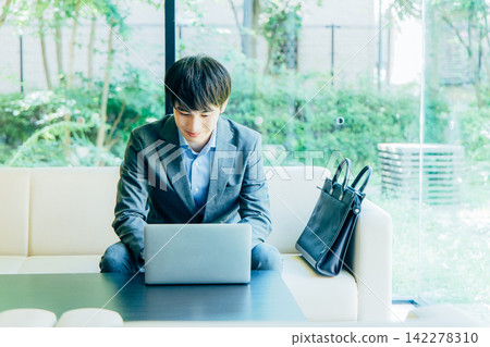 A man working in the lobby 142278310