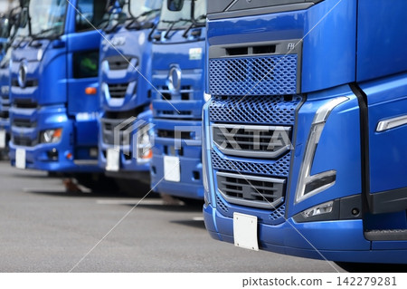 Large trucks lined up Large trucks lined up 142279281