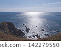 The sheer cliffs of Tachimachi Cape and the sparkling sea, Hakodate City, Hokkaido 142279550