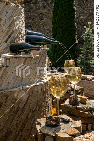 Beautiful stone wine fountain at Milestii Mici winery entrance Beautiful stone wine fountain at Milestii Mici winery entrance 142279782