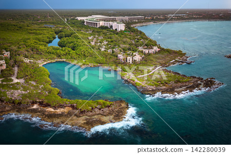 Luxury resort and stunning cliff overlooking the Caribbean Sea Luxury resort and stunning cliff overlooking the Caribbean Sea 142280039