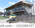 Excavator and apartment Excavator and apartment 142280337