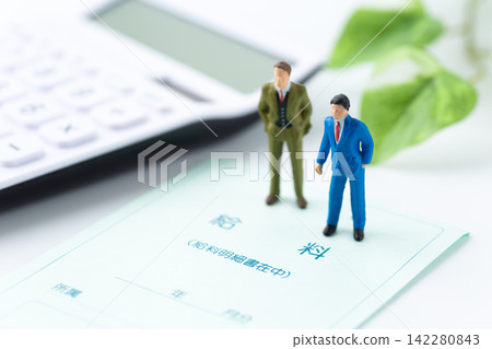 Businessmen and pay envelopes Businessmen and pay envelopes 142280843